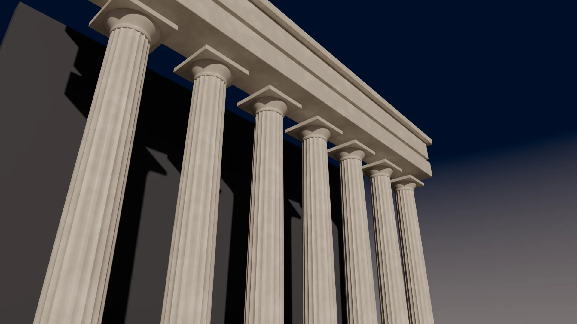Marble columns of a courthouse at dusk
